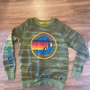 Army green aviator nation crewneck sweater size L. Tiny hole middle left front